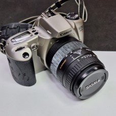 Canon EOS 3000N DSLR - Sigma Zoom 28-80mm f/3.5-5.6 Mark II Macro Lens – 35mm Film Camera | Used | 3 Months Warranty - 30311 Canon EOS 3000N DSLR - Sigma Zoom 28-80mm f/3.5-5.6 Mark II Macro Lens – 35mm Film Camera | Used | 3 Months Warranty - 30311
