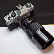 Praktica L 35mm SLR Film Camera with Hanimex Automatic 200mm f/3.5 Telephoto Lens – Fully Working with 3-Month Warranty Praktica L 35mm SLR Film Camera with Hanimex Automatic 200mm f/3.5 Telephoto Lens – Fully Working with 3-Month Warranty
